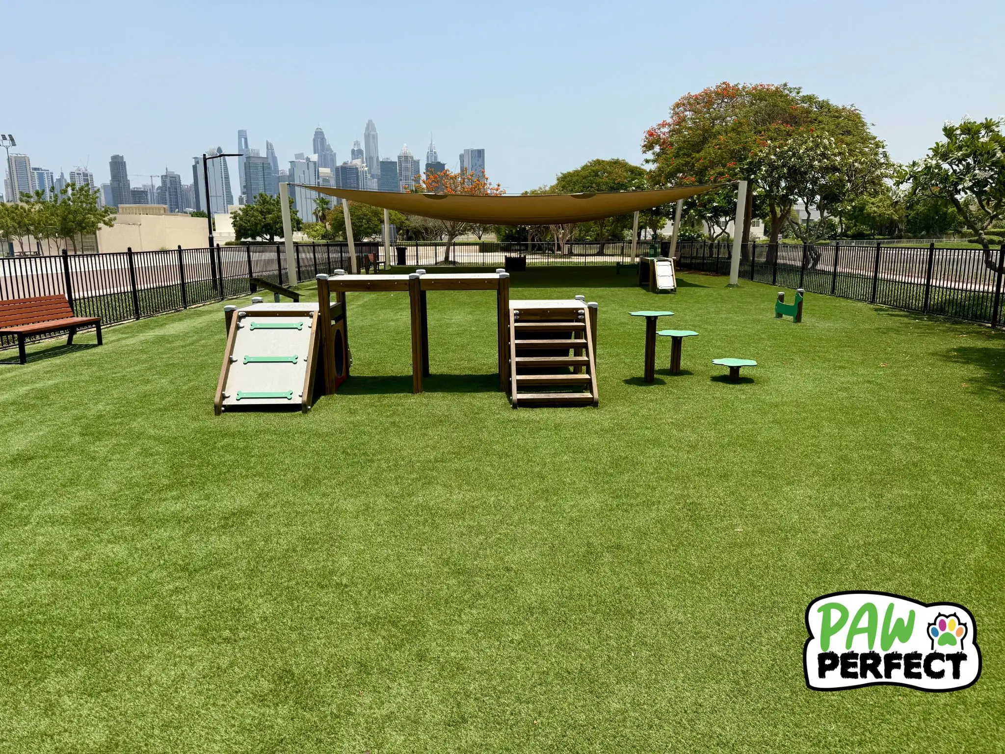 Low-maintenance artificial grass for dogs installed in a pet-friendly park in Dubai, ideal for safe and clean play areas